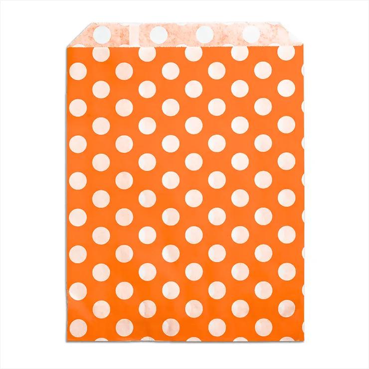 Sachets en papier à pois blancs, orange