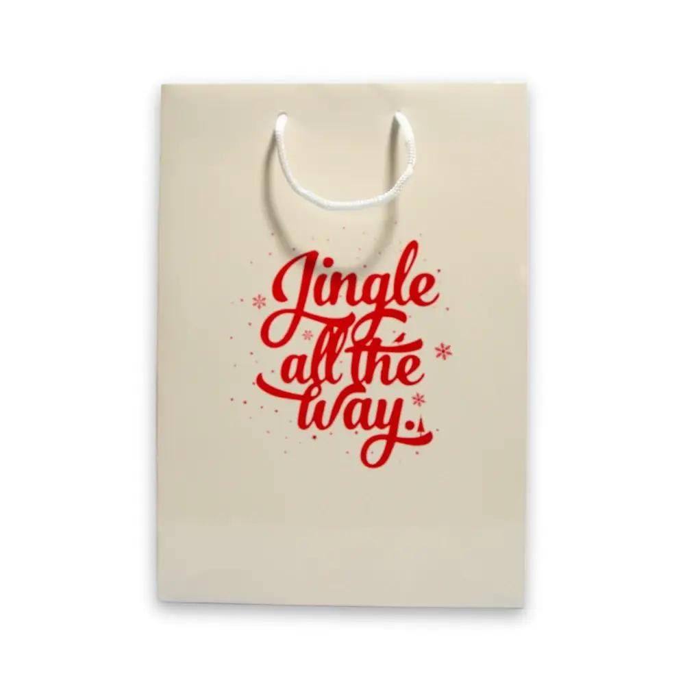 Sacs en papier luxe pelliculé "Jingle all the way" à poignées cordelettes